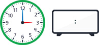 A clock with the hour hand pointing to “3” and the minute hand pointing to “12.” A blank digital clock.