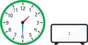 A clock with the hour hand pointing between “1” and “2” and the minute hand pointing to “6.” A blank digital clock.