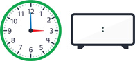 Hay un reloj con la manecilla de la hora apuntando al “3” y el minutero apuntando al “12”. Hay un reloj digital en blanco.